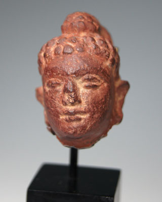 An Earthenware Bodhisattva Head, Gandhara, 2nd century AD