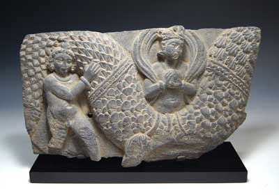 A Grey Schist frieze of an Amorino with Garland, Gandhara, Kushan Period, 3rd century A.D.