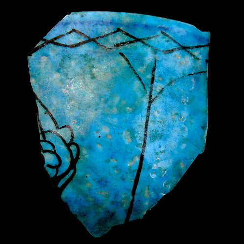 A superb Islamic azure glazed faience bowl fragment, 12th century AD