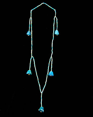 An Egyptian Faience and Lotus Bead Necklace, 18th Dynasty ca 1550 - 1295 BC