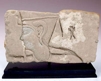 An Egyptian Royal Sandstone Relief Fragment of a Pharaoh, Ptolemaic Period ca 332 - 30 BC