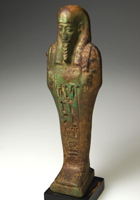 An Egyptian Green Glazed Faience Ushabti for Asetemkheb, 26th Dynasty c. 664 -525 B.C.