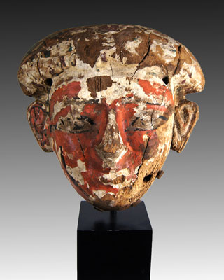 An Egyptian Wood and Polychrome Anthropoid Mask, 21st Dynasty ca 1069 - 945 BC