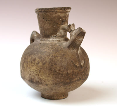 An Iranian greyware spouted jar, ca early 1st millennium BC