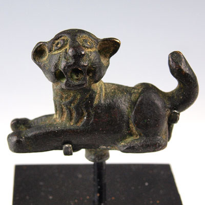A fabulous Roman bronze recumbent lion cub, ca 1st century AD