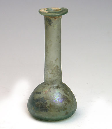 A Roman glass candlestick unguentarium, ca 1st - 2nd century AD