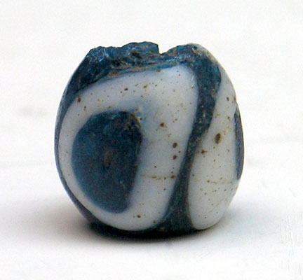 A Roman Blue and White Glass Eye Bead, ca 1st century AD