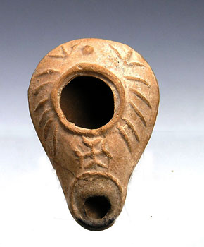 An early Christian clay oil lamp, ca 4th century AD