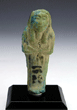A Rare Blue Glazed Faience Worker Shabti for a Dwarf, 21st Dynasty, ca 1069-945 B.C.
