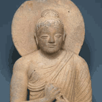 A large gray schist figure of a seated Buddha, Gandhara c. 3rd century A.D.
