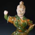 A Chinese Sancai-Glazed Clay Guardian Figure, Tang Dynasty,   618-907 AD