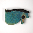 An Egyptian faience wedjat-eye amulet, Late Period ca. 664-332BC