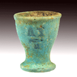 An Egyptian Blue glazed Faience Oil Cup, Dynasty 26, 664-525 BC