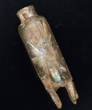 A Fatimid glass molar flask, Egypt, 10th/11th century AD