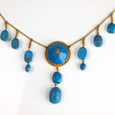 An Egyptian Azure-glazed Faience Scarab Necklace, 18th Dynasty, Amarna Period ca 1360 BC