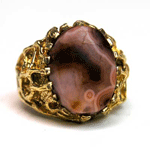 A fine Egyptian Red Agate Bead, ca 664-332BC set in gold ring