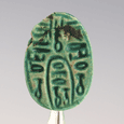 An Egyptian green glazed "anra" protection scarab, Middle Kingdom  ca 1502  1482 BC