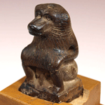 An Egyptian Limestone Statuette of a Baboon, New Kingdom ca 1550-1069BC