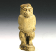 An Egyptian hybrid glazed composition baboon, Late Period ca 664-332BC