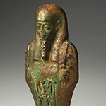 An Egyptian Green Glazed Faience Ushabti for Asetemkheb, 26th Dynasty c. 664 -525 B.C.
