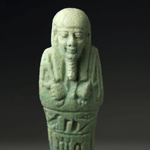 An Egyptian Green Glazed Faience Ushabti for Horpenaset, 30th Dynasty c. 365 -332 B.C.