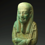 An Egyptian Green Glazed Faience Ushabti for the Overseer of the army Horkhebi, 26th Dynasty c. 664 -525 B.C.