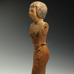 An Egyptian Wood Figure of a Man, Middle Kingdom, ca 2055-1773 B.C.