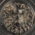 A Greek Black-Glaze Guttos with Pan, Magna Graecia, ca 4th Century B.C.