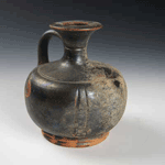 A Greek Black Glazed Squat Lekythos, ca 4th Century B.C.