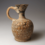 A Greek terracotta Squat Net Lekythos, circa 3rd century BC