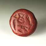 A Hittite red jasper button seal, Late Bronze Age, 14th -13th century BC