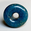 A large, early Islamic Glass bead, ca 8th century AD