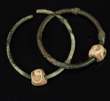 A pair Persian bronze and bead earrings, ca 1st millennium BC