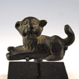 A fabulous Roman bronze recumbent lion cub, ca 1st century AD