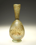 A Roman green glass flask, late 1st or 2nd century A.D.