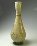 A Roman green glass flask, late 1st or 2nd century A.D.