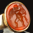 A Roman carnelian intaglio ring stone of Eros, ca 2nd century AD