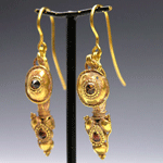 A fine pair of Roman gold and garnet earrings, ca 1st - 2nd century AD